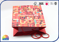 CMYK 4C Printed Customized Paper Gift Bags Resuable Eco Friendly With Ribbon Handle